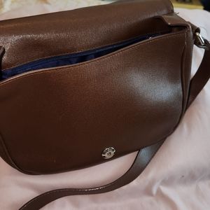 Furla crossbody bag. Still has a lot of life . Very strong and beautiful.